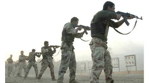 Soldiers with AK 47 Rifles
