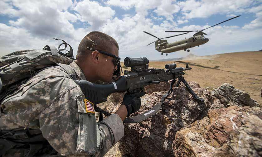 Army soldier with a machine gun