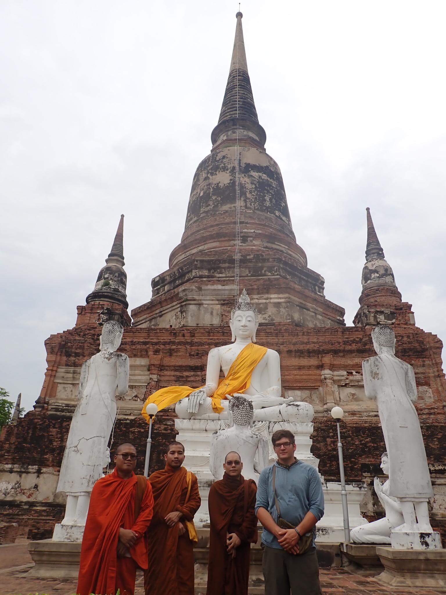 Zayne with monks in Ayutthaya, Thailand